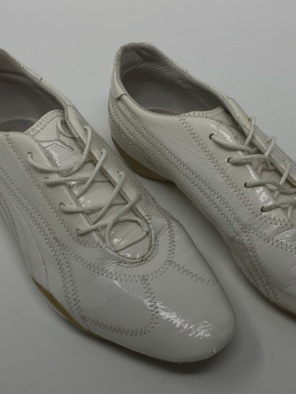 Puma white patent leather lace up Athleisure shoes Sneakers Sleek Shiny